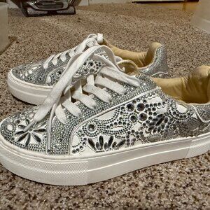 Rhinestone-embellished platform sneaker by Betsey Johnson